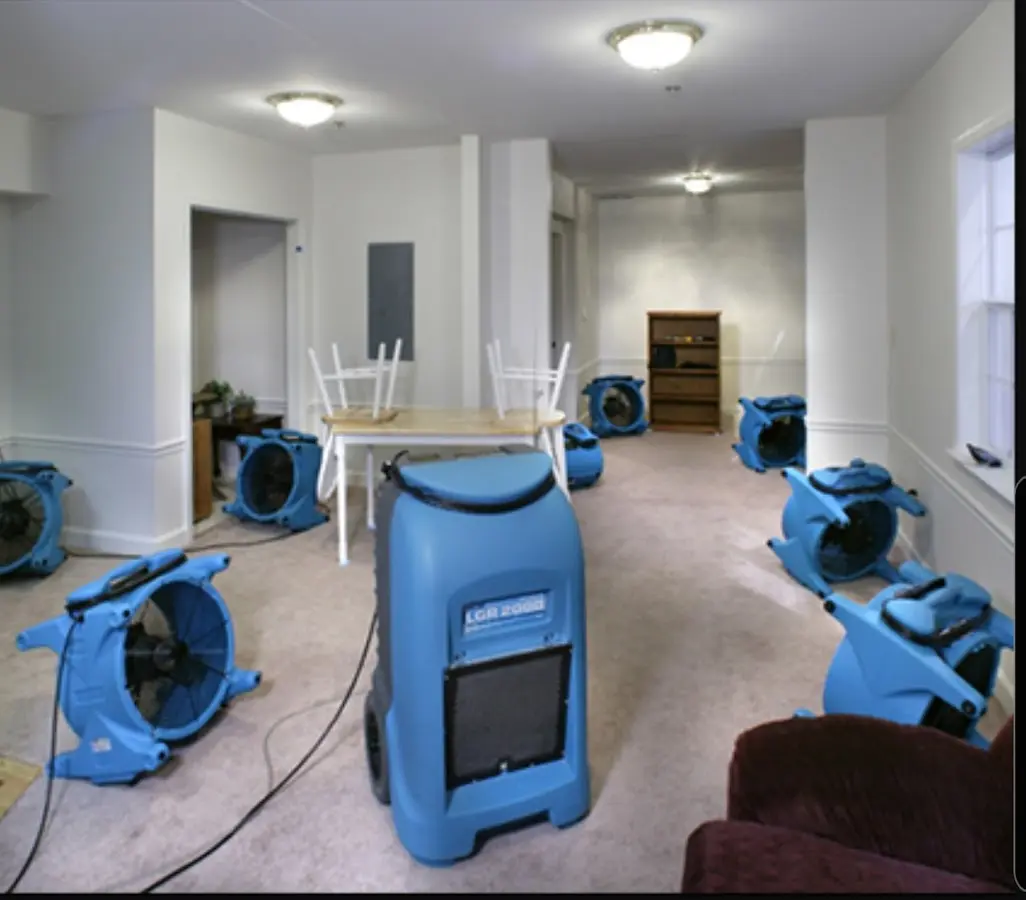 Air movers and dehumidifier setup for Water Damage Restoration in Marysville